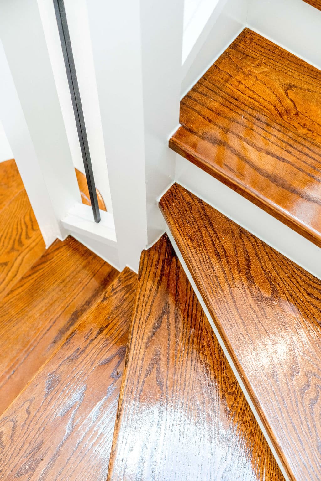 Wilton project — traditional staircase with timber treads and iron spindle balustrade, craftsmanship detail