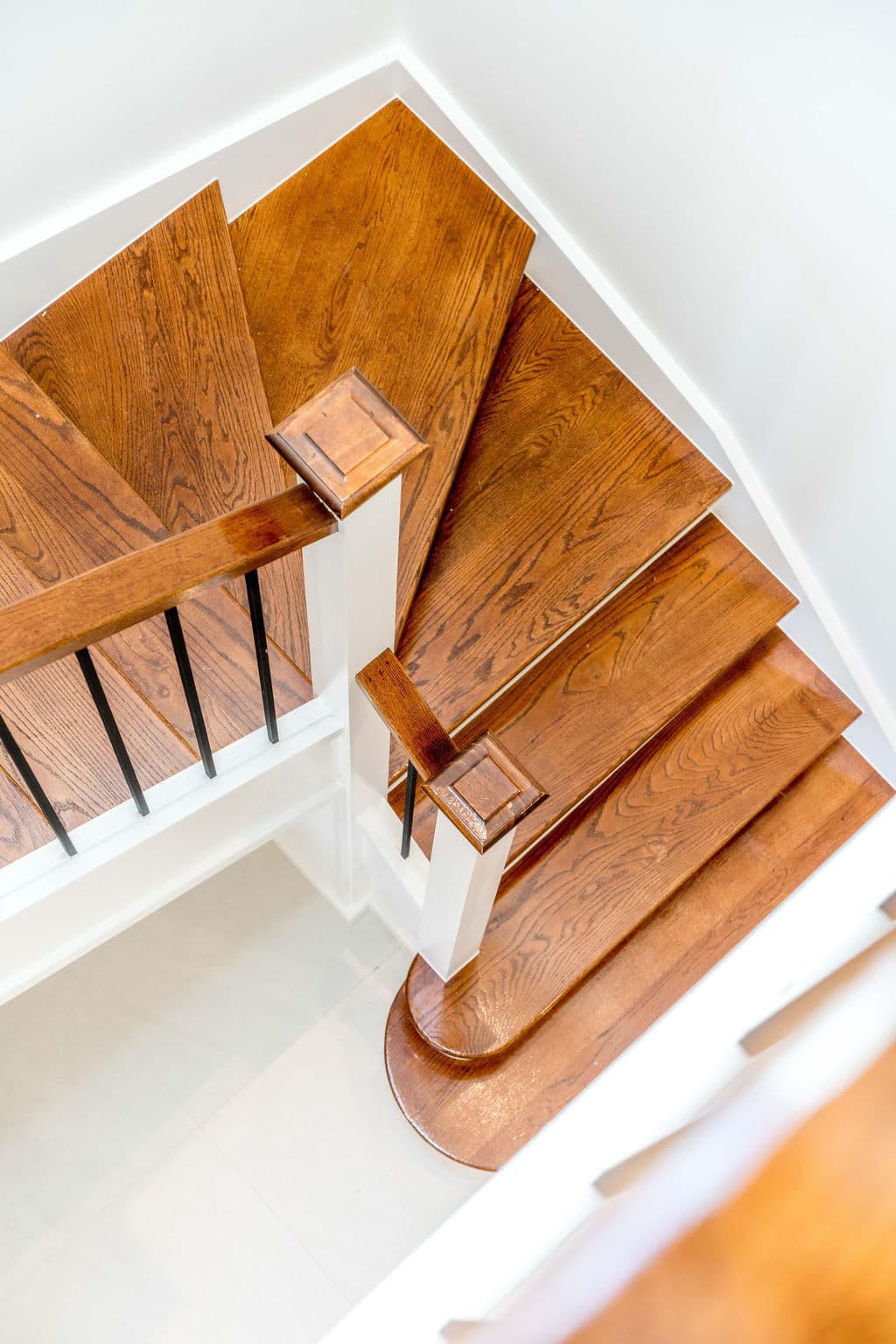 Wilton project — traditional staircase with timber treads and iron spindle balustrade, craftsmanship detail