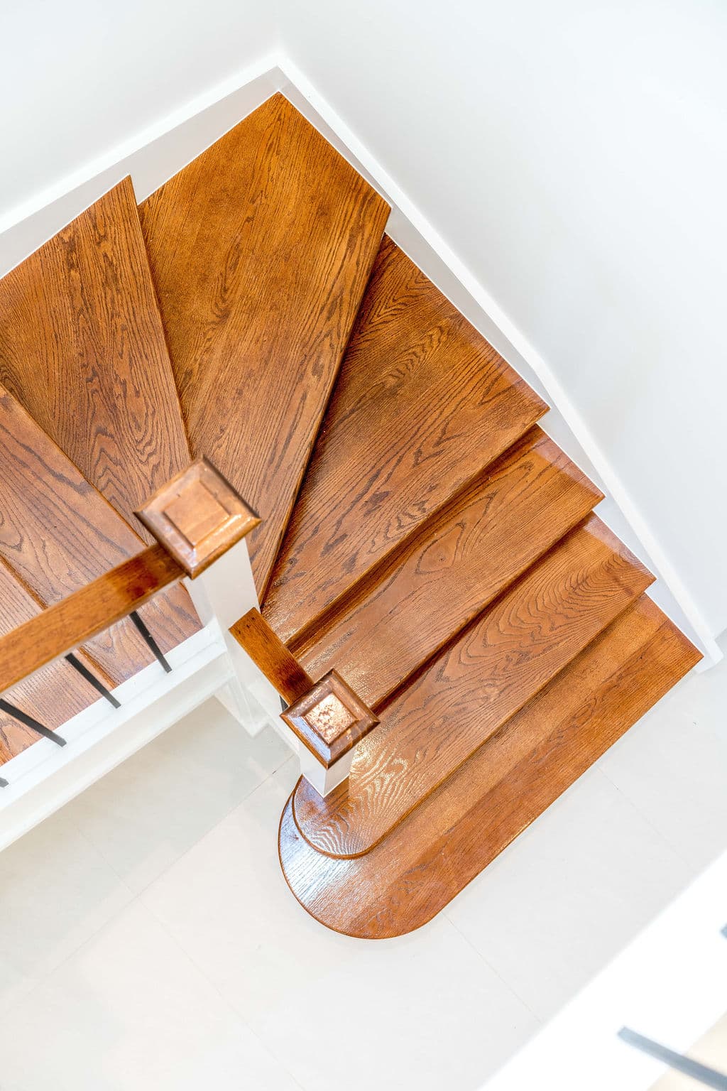 Wilton project — traditional staircase with timber treads and iron spindle balustrade, craftsmanship detail