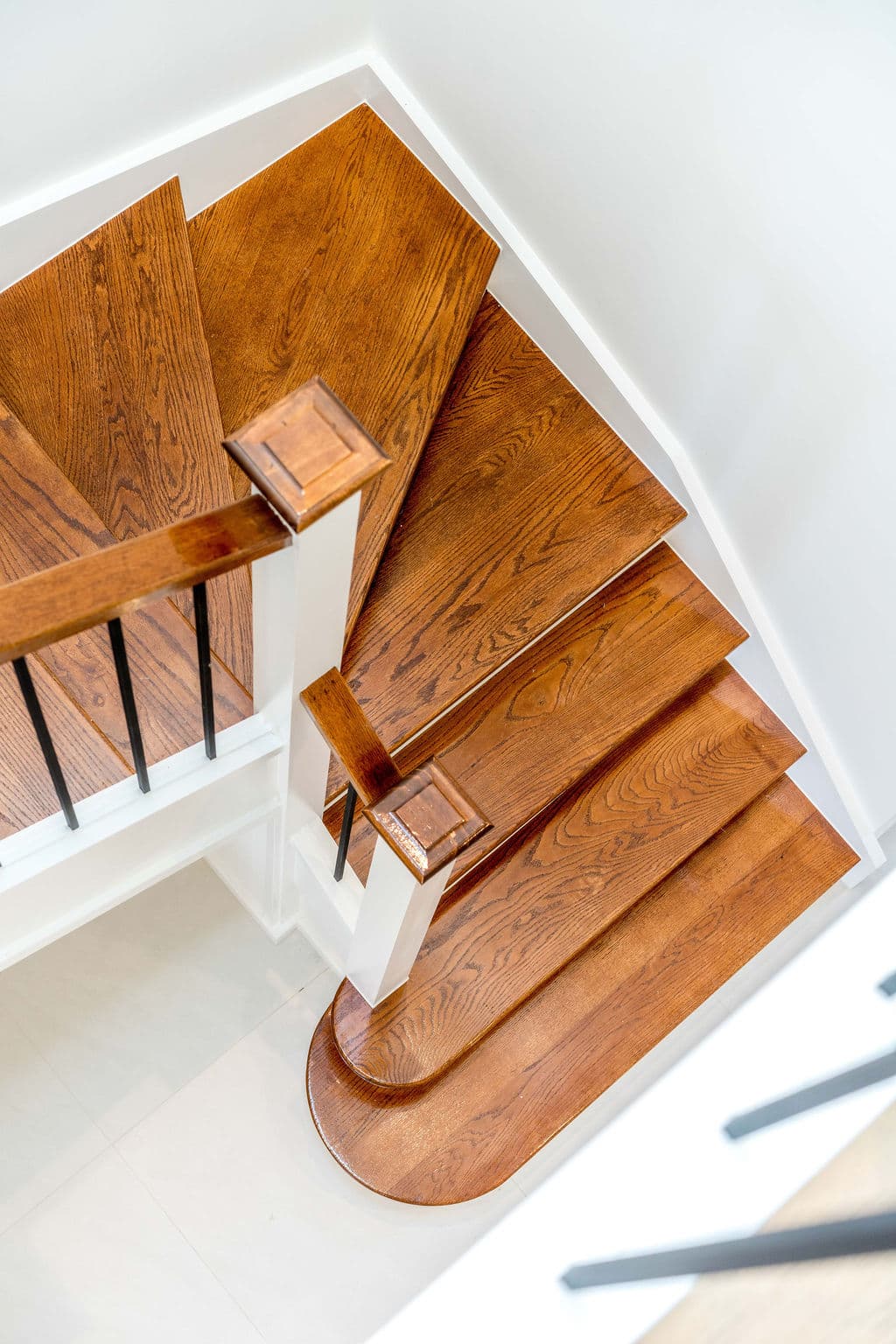 Wilton project — traditional staircase with timber treads and iron spindle balustrade, craftsmanship detail