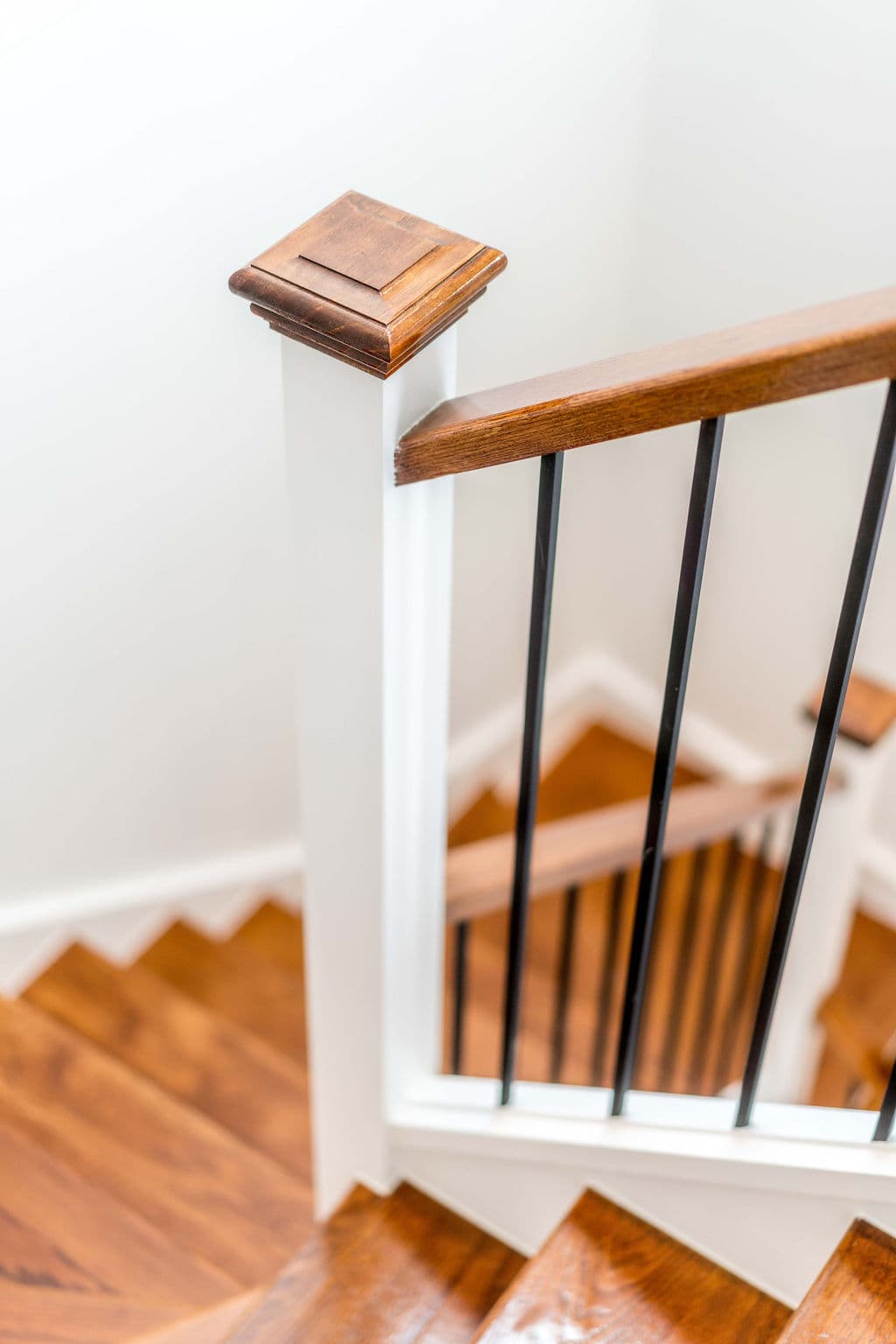 Wilton project — traditional staircase with timber treads and iron spindle balustrade, craftsmanship detail