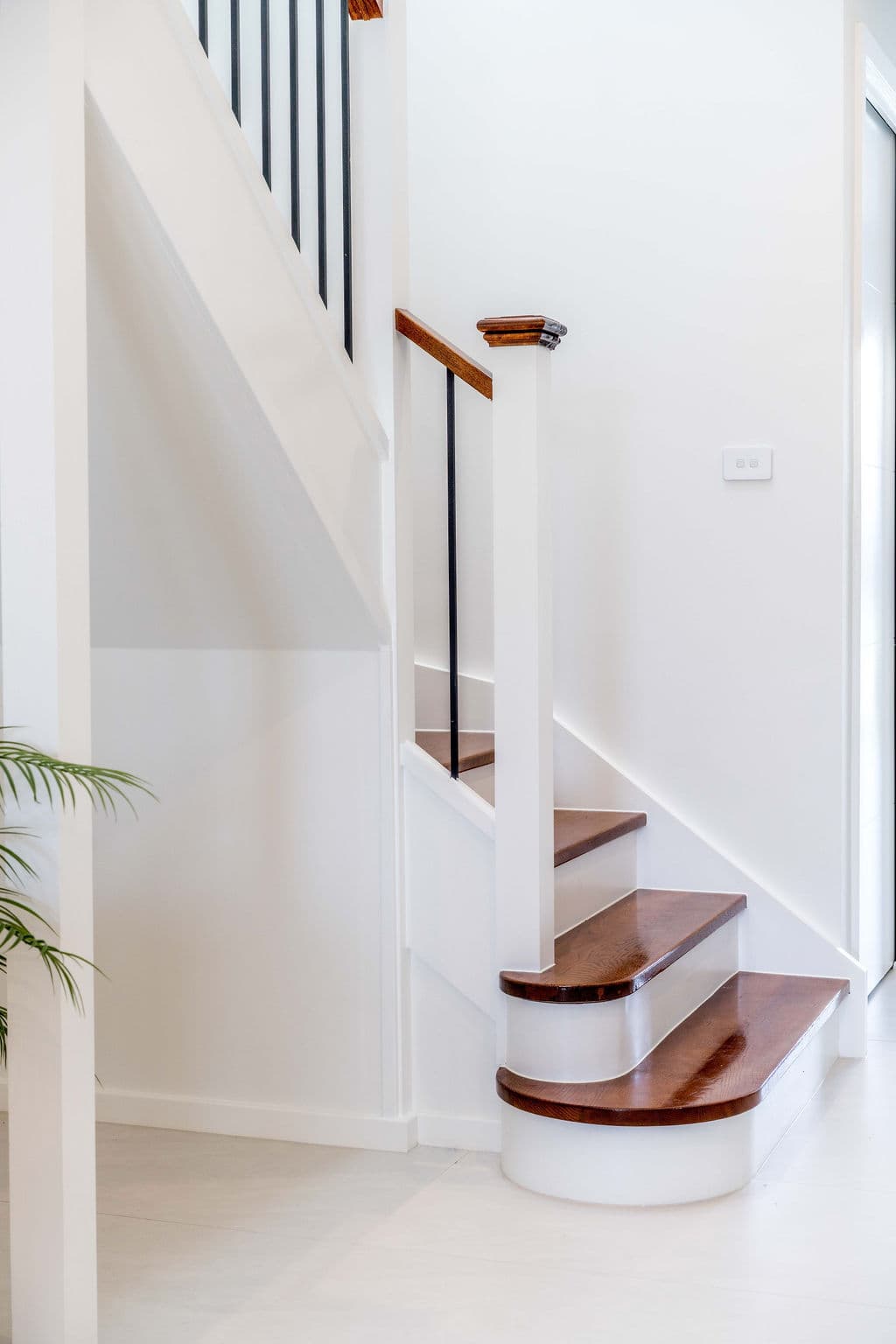 Wilton project — traditional staircase with timber treads and iron spindle balustrade, craftsmanship detail