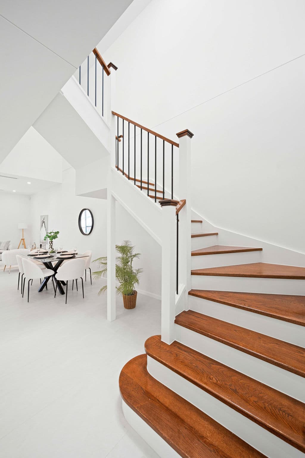 Wilton project — traditional staircase with timber treads and iron spindle balustrade, wide view