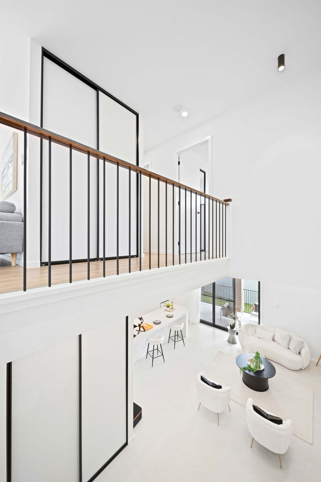 Wilton project — traditional staircase with timber treads and iron spindle balustrade, wide view