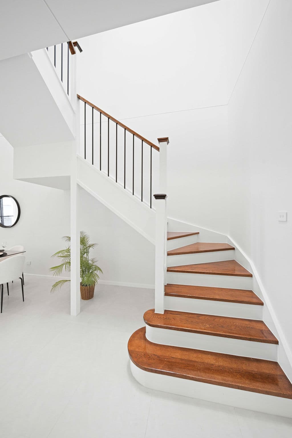 Wilton project — traditional staircase with timber treads and iron spindle balustrade, wide view