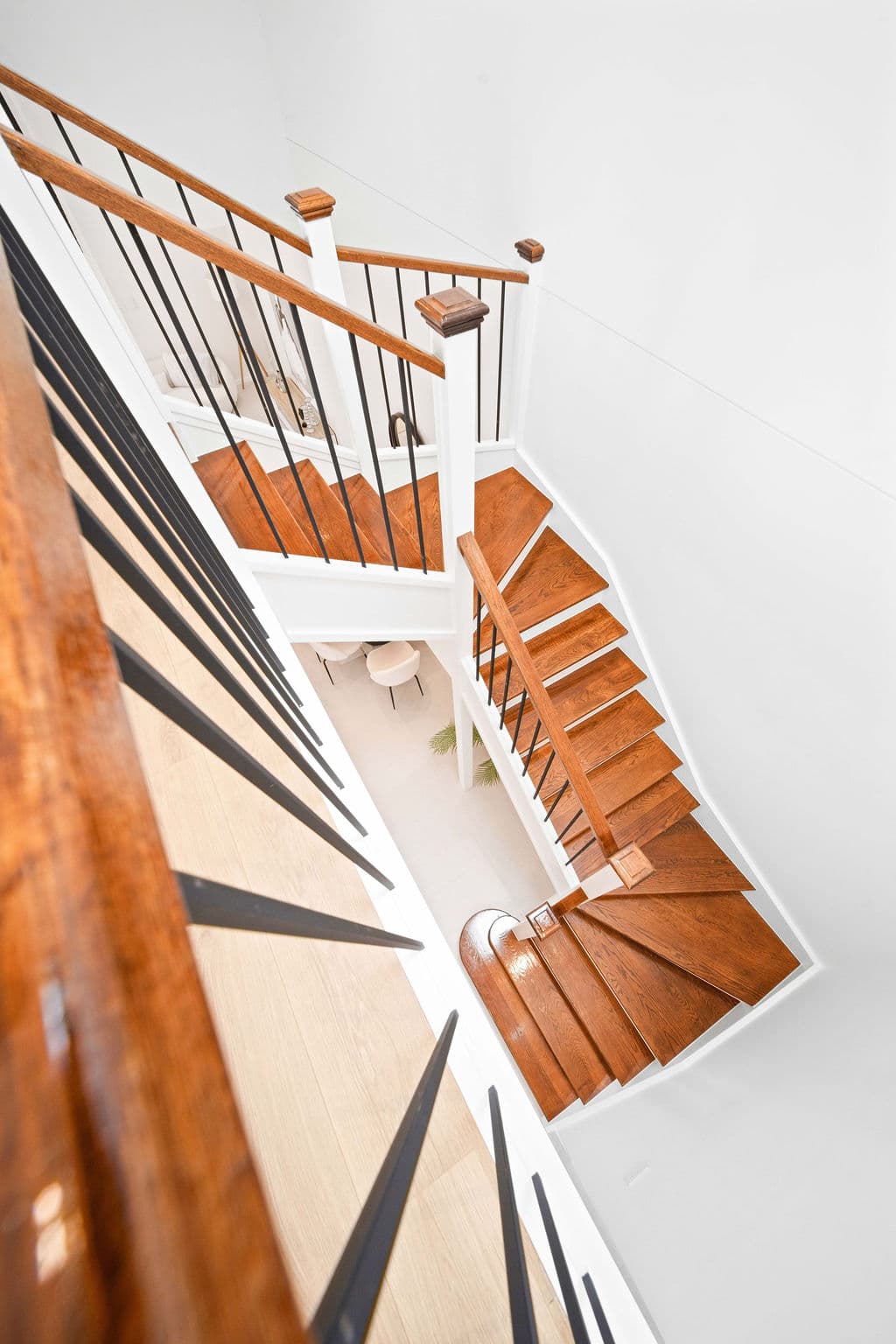 Wilton project — traditional staircase with timber treads and iron spindle balustrade, wide view