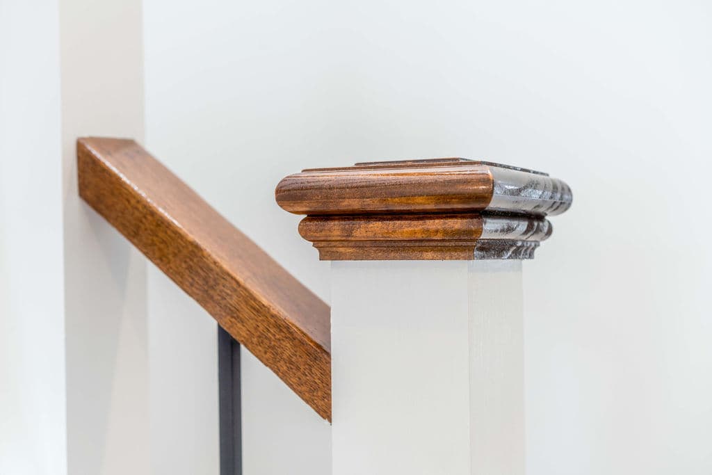 Wilton project — traditional staircase with timber treads and iron spindle balustrade, craftsmanship detail